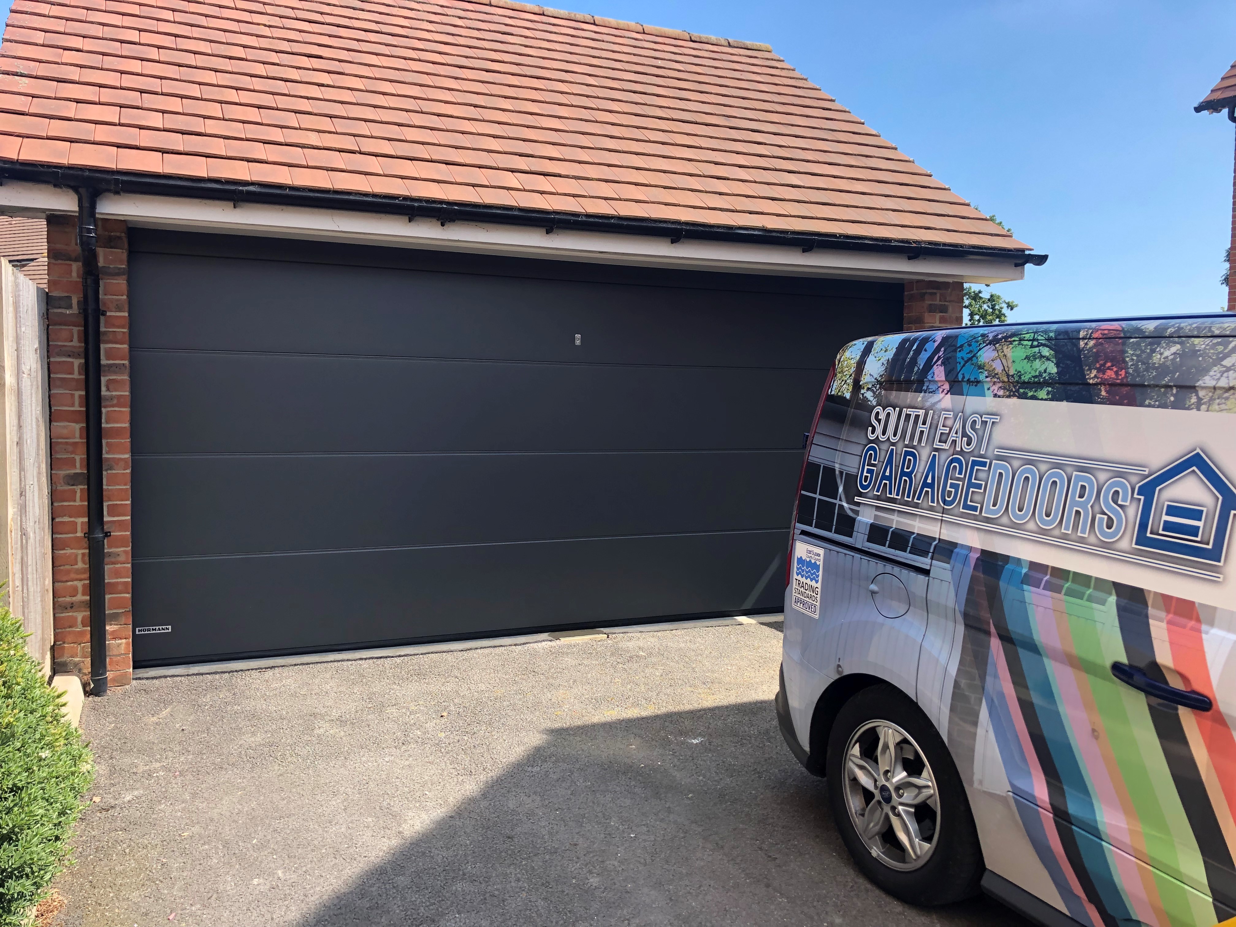 Convert Two Single Garage Doors Into One South East Garage