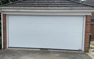 two garage doors to one