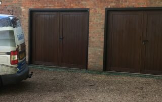 replace wooden garage doors