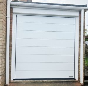 New garage door to replace inherited shabby door