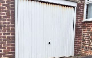 Garage door damaged by rust